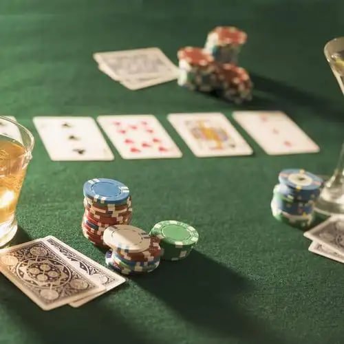 Super Sic Bo live dealer studio showing dice shaker and three dice